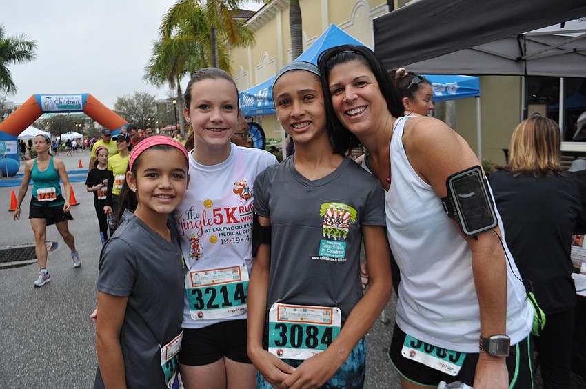 Emma DeCastro, Emily Manning and Savannah and Julia DeCastro run the 10K.