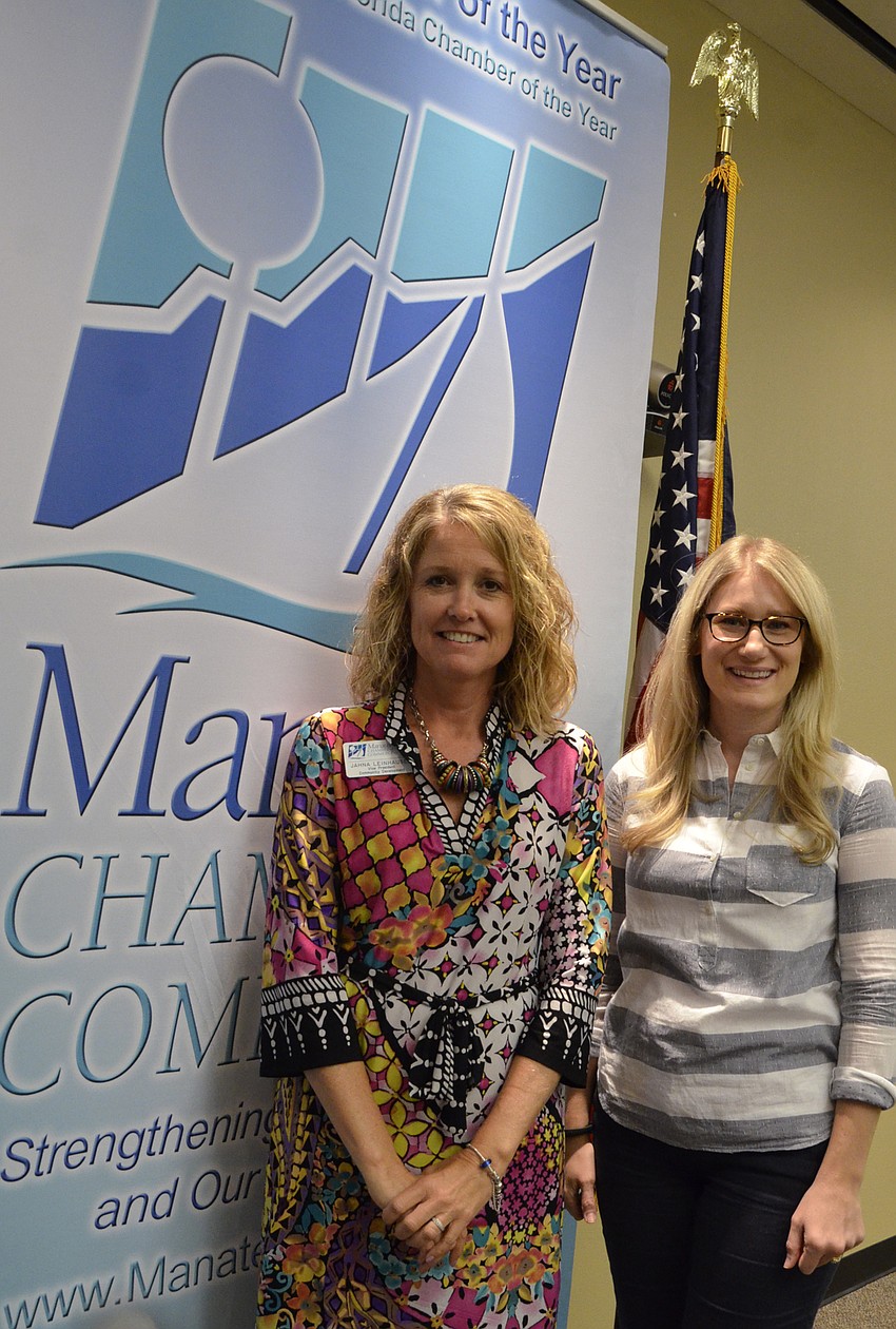 Jahna Leinhauser, vice president of the Chamber's community development department, and Leigh Weger, executive assistant.