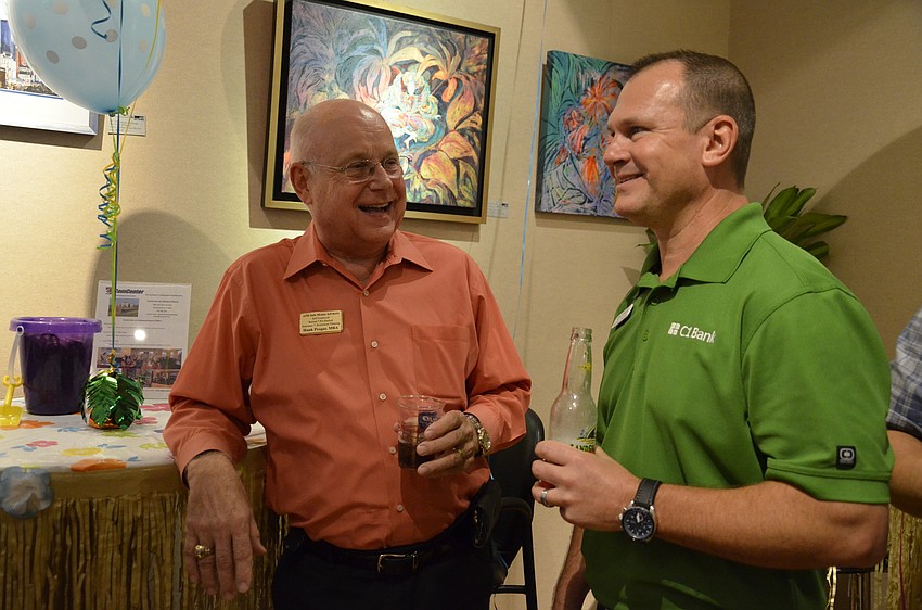 Hank Progar and Michael Talerico chat after a stop at the tiki bar.