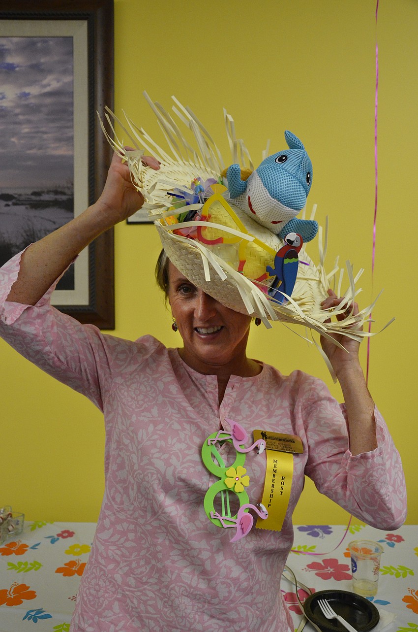 Judy Athari sports her hat, which she crafted herself.