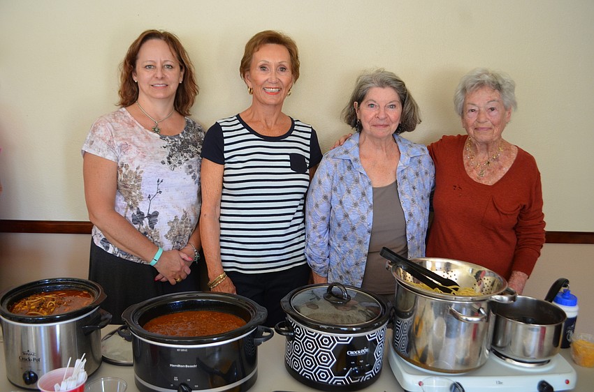 Chili cooks Renee Vandenbusch, Peggy Keefe, champion Julie Brogan and June Lefkovitz