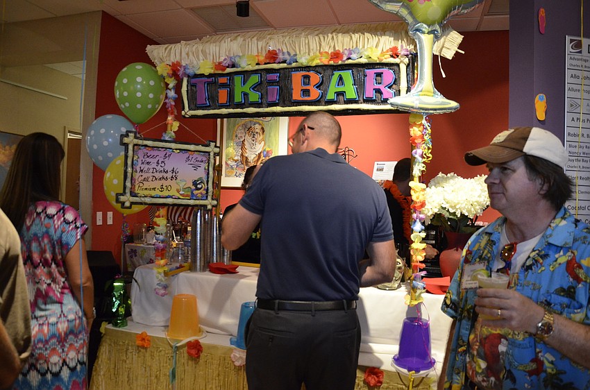 Alliance members flocked to the tiki bar during the social hour.