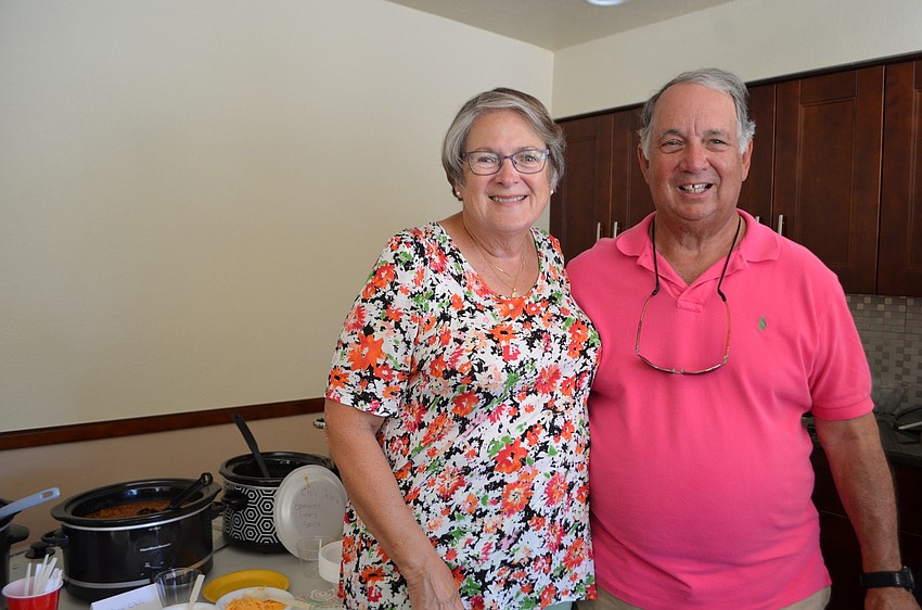 Ray Lombra (right), president of the Pelican Harbour Association, with wife Bobbi
