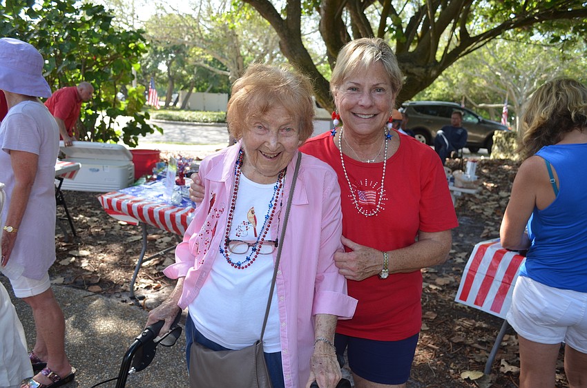 Grand Marshal Virginia Sanders with Longboat Key Chamber of Commerce President Gail Loefgren