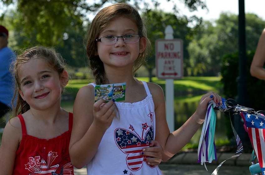 Courtney and Cristina Springfield won the best decorated bike contest after participating in the GreyHawk Landing Community Parade.