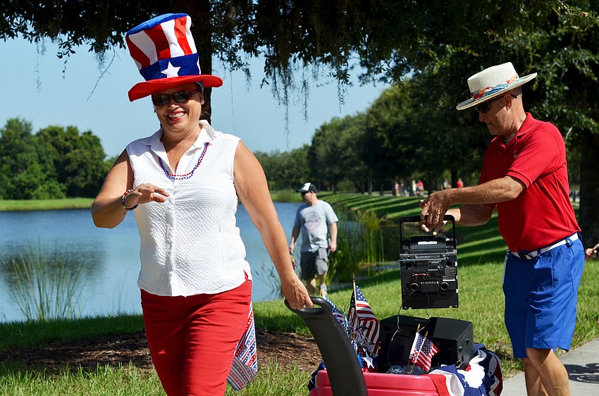 Diane Fierle leads the GreyHawk Landing Community Parade