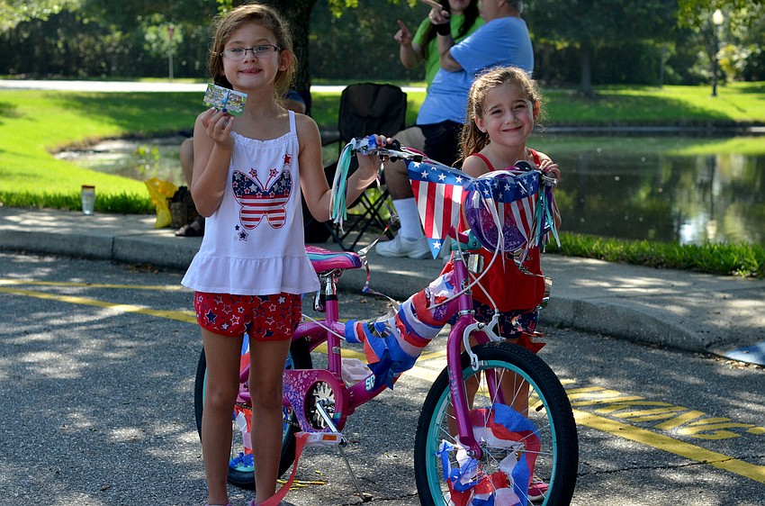 Cristina and Courtney Springfield won the best decorated bike contest after participating in the GreyHawk Landing Community Parade.