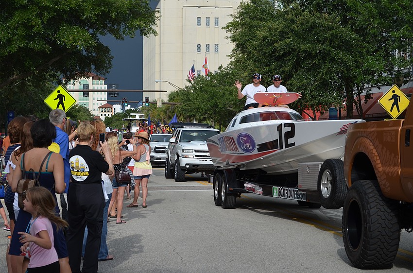 Powerboats on parade down Main Street in Downtown Sarasota.