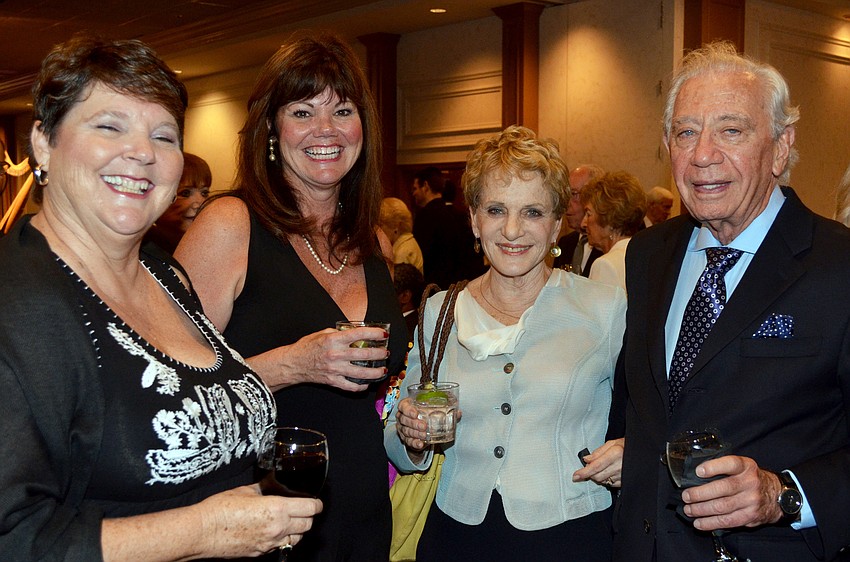 Becky Schuster and Cindy Lang with Charlotte and Charles Perret