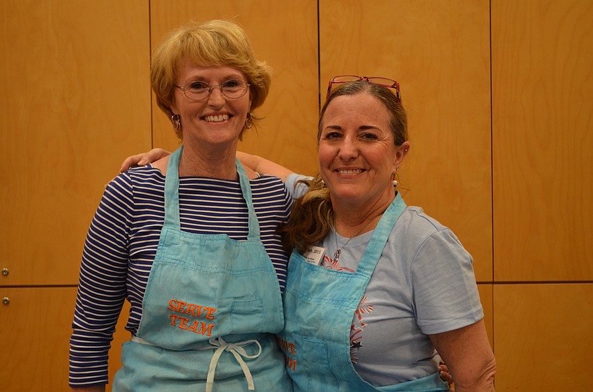 Barbara smith and Pam Younkman helped prepare the BBQ for the event.