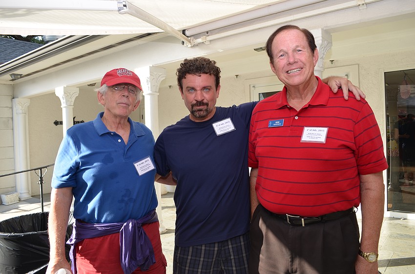 Father Dick Lampert, Chris Bersch and Ron Rayevich