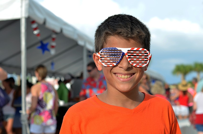 Lucian Negron rocks some American shades at the VIP Party.