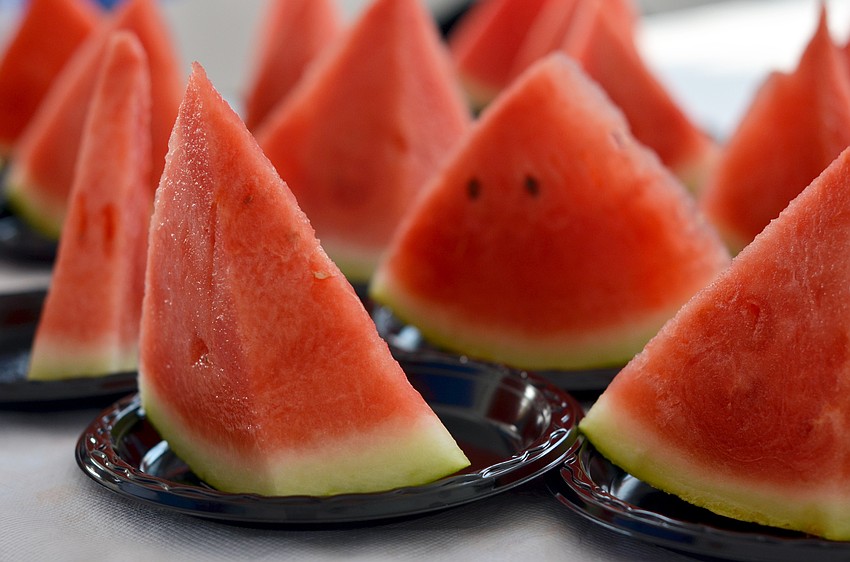 Guests enjoyed watermelon at the Siesta Key Chamber of Commerce's Fourth of July Fireworks Celebration VIP Party.