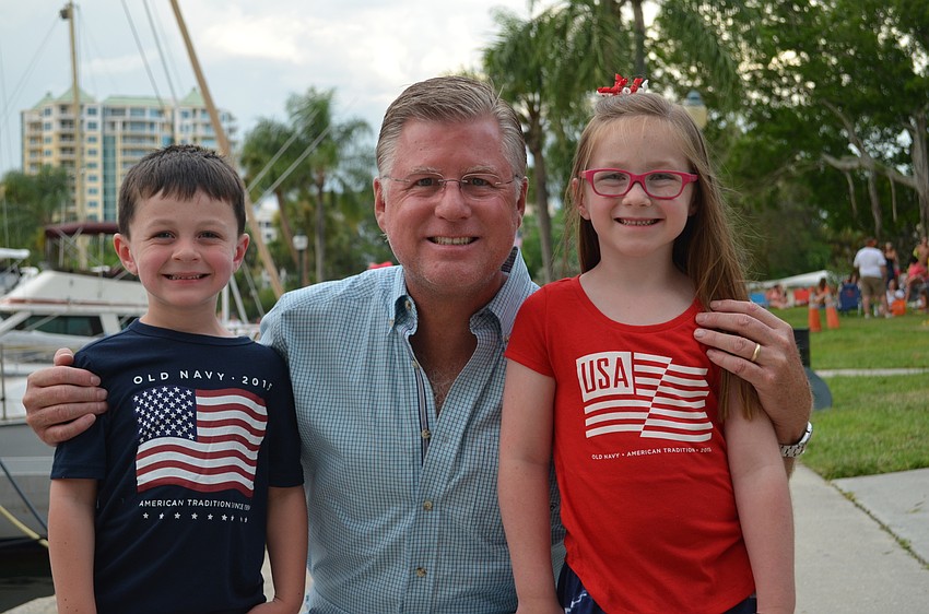 Harrison, Dave and Genevieve Pritchett at Bayfront Park for the fireworks show.