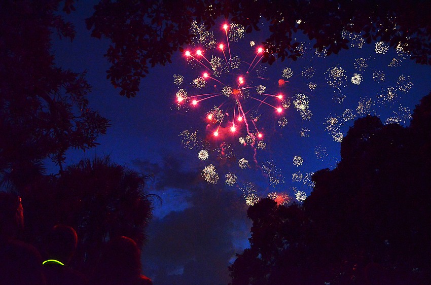 Fireworks light up the sky above the Sarasota Bay at Bayfront Park.