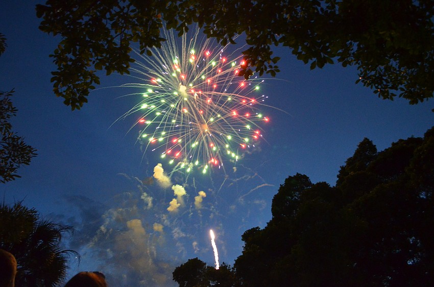 Fireworks light up the sky above the Sarasota Bay at Bayfront Park.