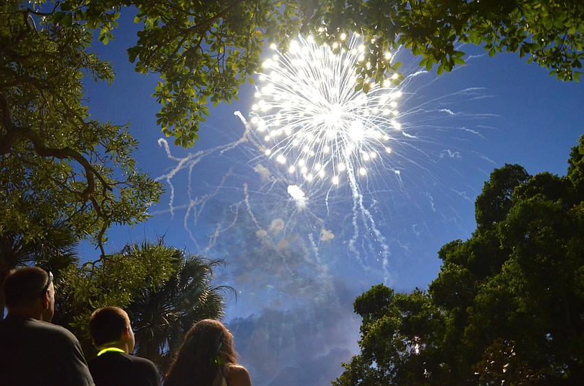 Fireworks light up the sky above the Sarasota Bay at Bayfront Park.