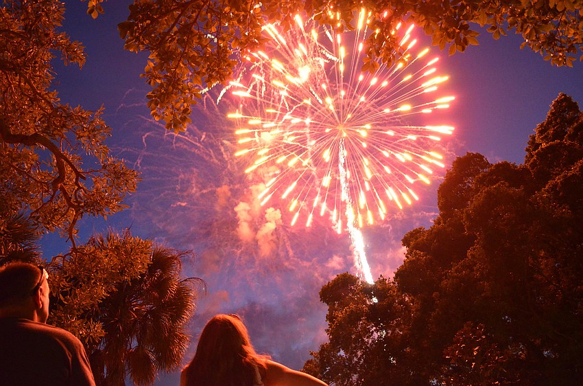 Fireworks light up the sky above the Sarasota Bay at Bayfront Park.