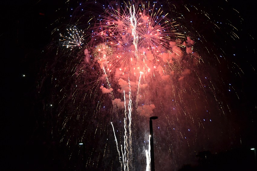 Fireworks light up the sky above the Sarasota Bay at Bayfront Park.