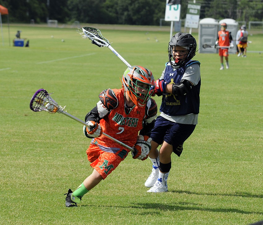 Monsters U11 player Ramsey Choueiri attempts to maneuver the ball around a LB3 CP22 Boca U11 Select defender.
