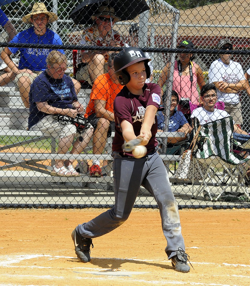 Braden River Little League 9/10 All-Star James Guest makes contact during his team’s game versus Manatee National.