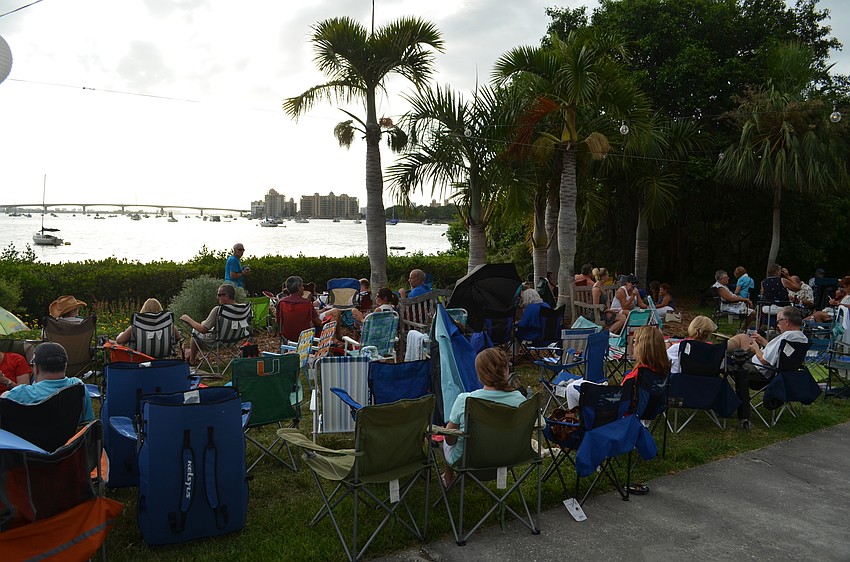 Firework fans set up their respective stations inside the Marie Selby Botanical Gardens.