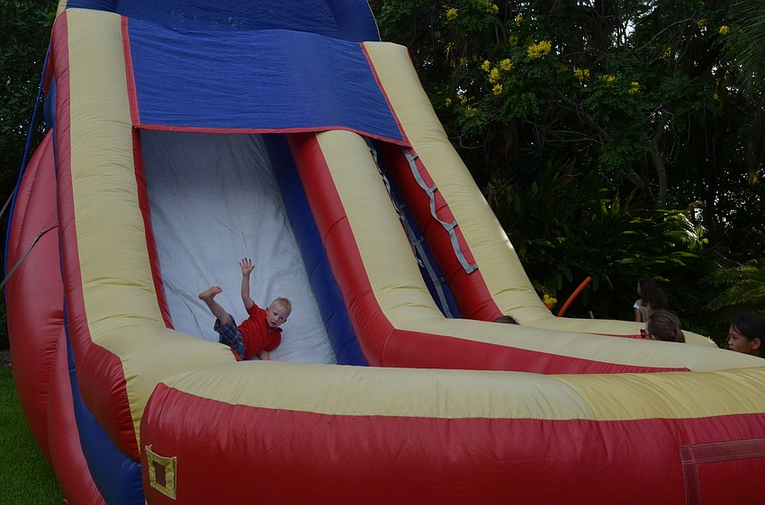 Kids and families enjoyed the inflatable slides and games in the kids garden.