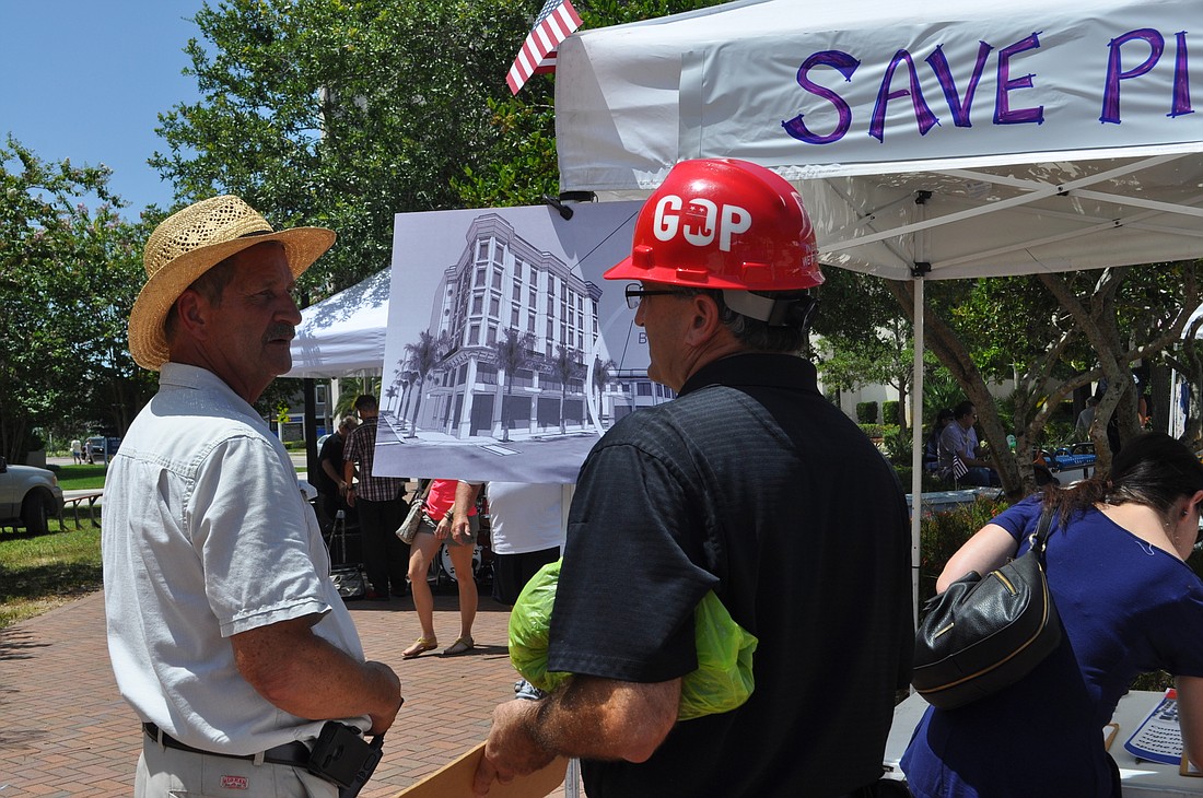Sarasota Farmers Market Manager Phil Pagano, left, wants to make sure the event isn't jeopardized by a loss of space as construction continues downtown.