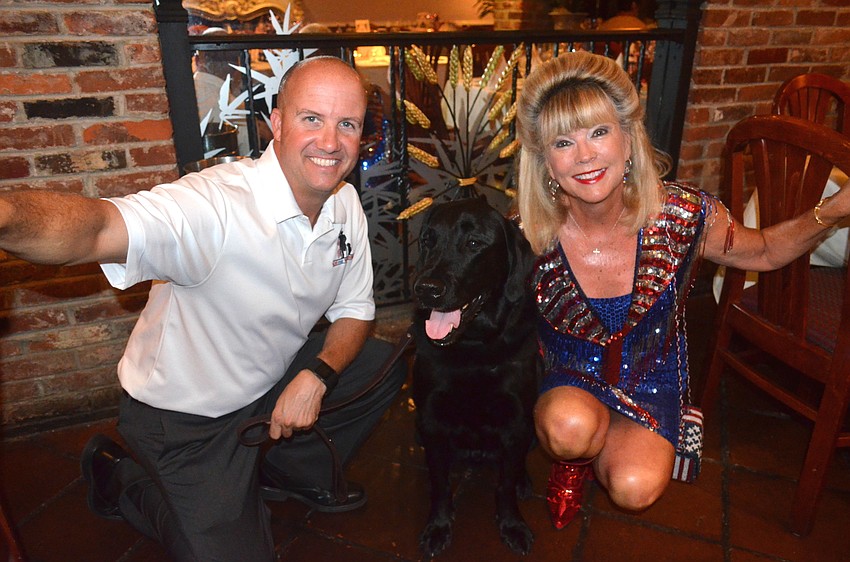 Denis Oliverio, of K9s for Warriors, and Operation Kindness President Joanne Forch with Winchester