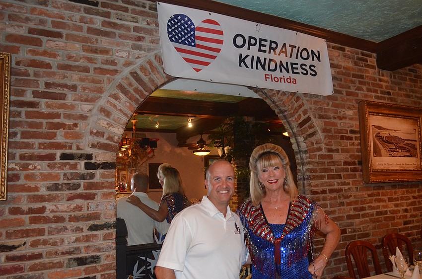 Denis Oliverio, of K9s for Warriors, and Operation Kindness President Joanne Forch