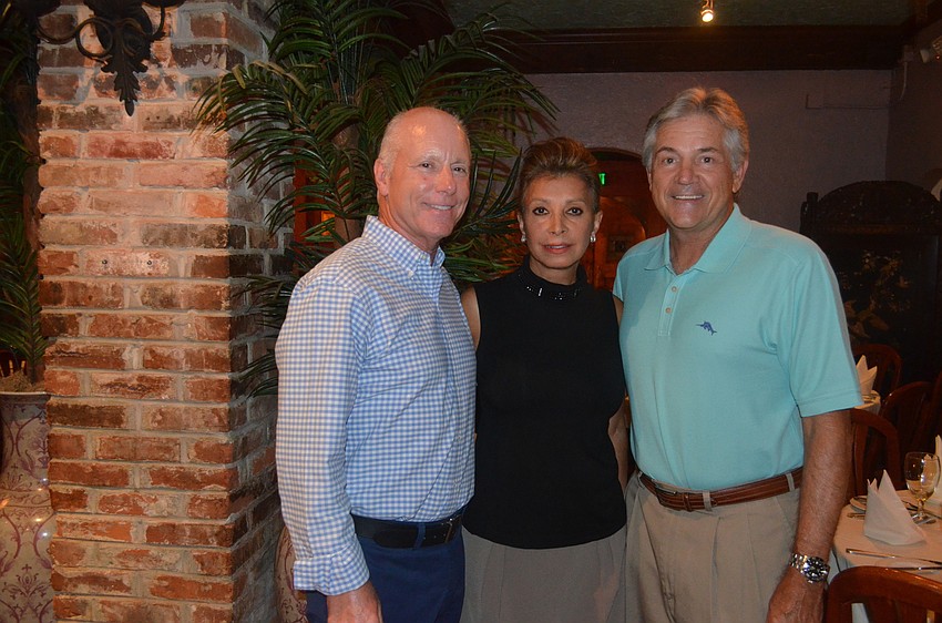 Hugh and Freshta Sawyer with John Forch