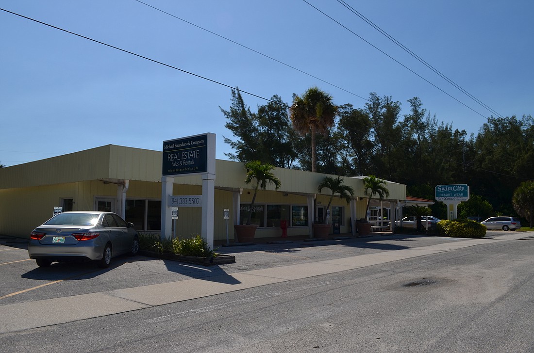 The plaza at 3170 Gulf of Mexico Drive has 3,200 square feet of living space and houses the mid Longboat Key real estate office of Michael Saunders & Co.