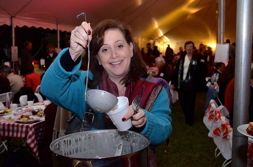 Denise Cotler taste tests the clam chowder.