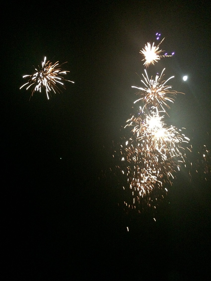 Following the lobster dinner, guests gathered around the bonfires on the beach for a firework display.