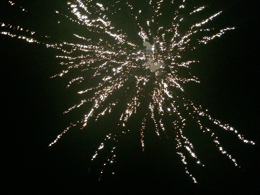 Following the lobster dinner, guests gathered around the bonfires on the beach for a fireworks display.