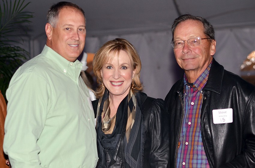 Sherriff Tom Knight with Teri Hansen and Steve Wilberding