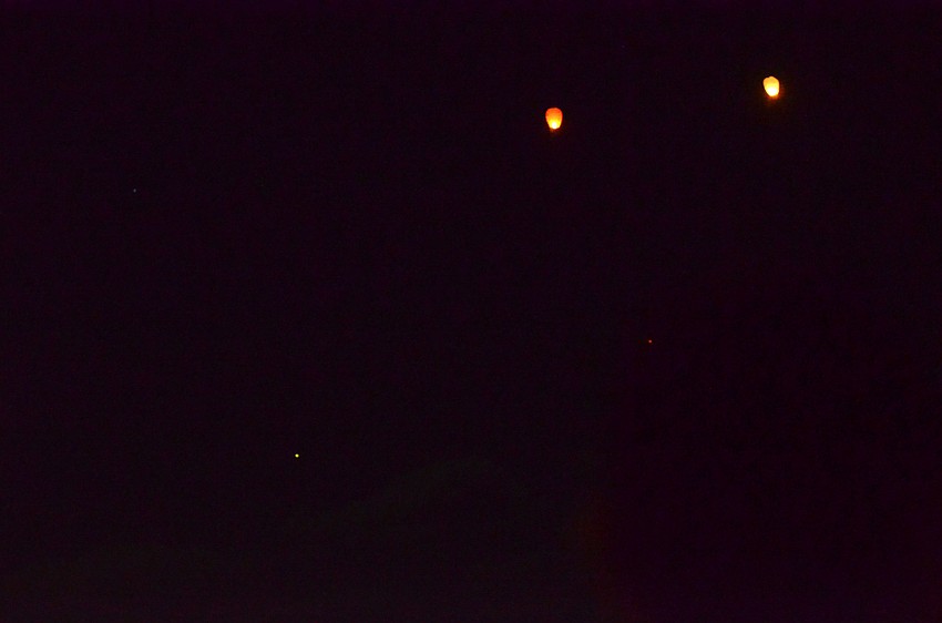 Guests released sky lanterns over the gulf.