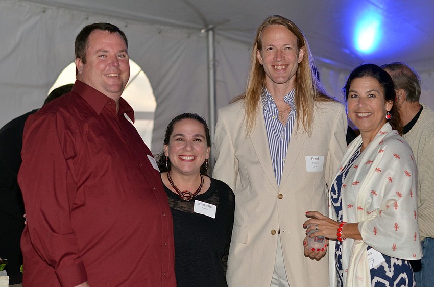 Brad and Michelle Pearson, Frank Filipanits and Co-Chair Paula Murray