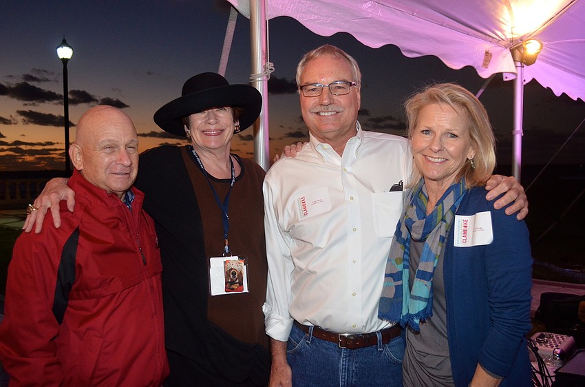 Co-Chairs Kathleen and Stephen Raskin, and Peter and Katie Hayes enjoy the results of their labor.