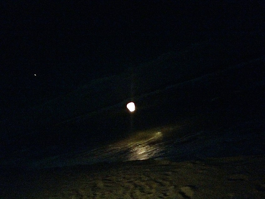 Guests released sky lanterns over the gulf.
