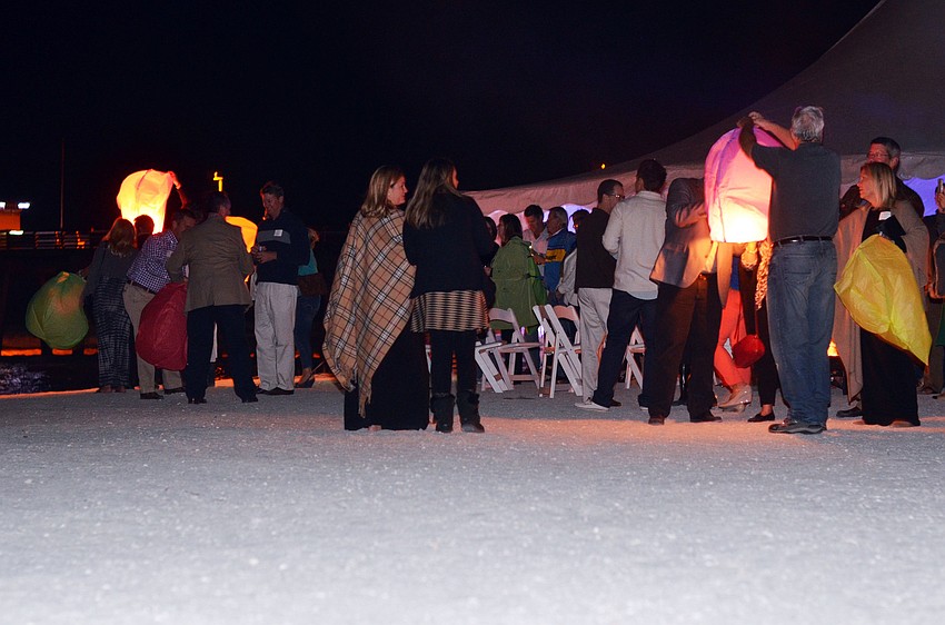 Guests gathered on the beach for a fireworks display followed by social time around the bonfires, a sâ€™mores bar and sky lanterns.