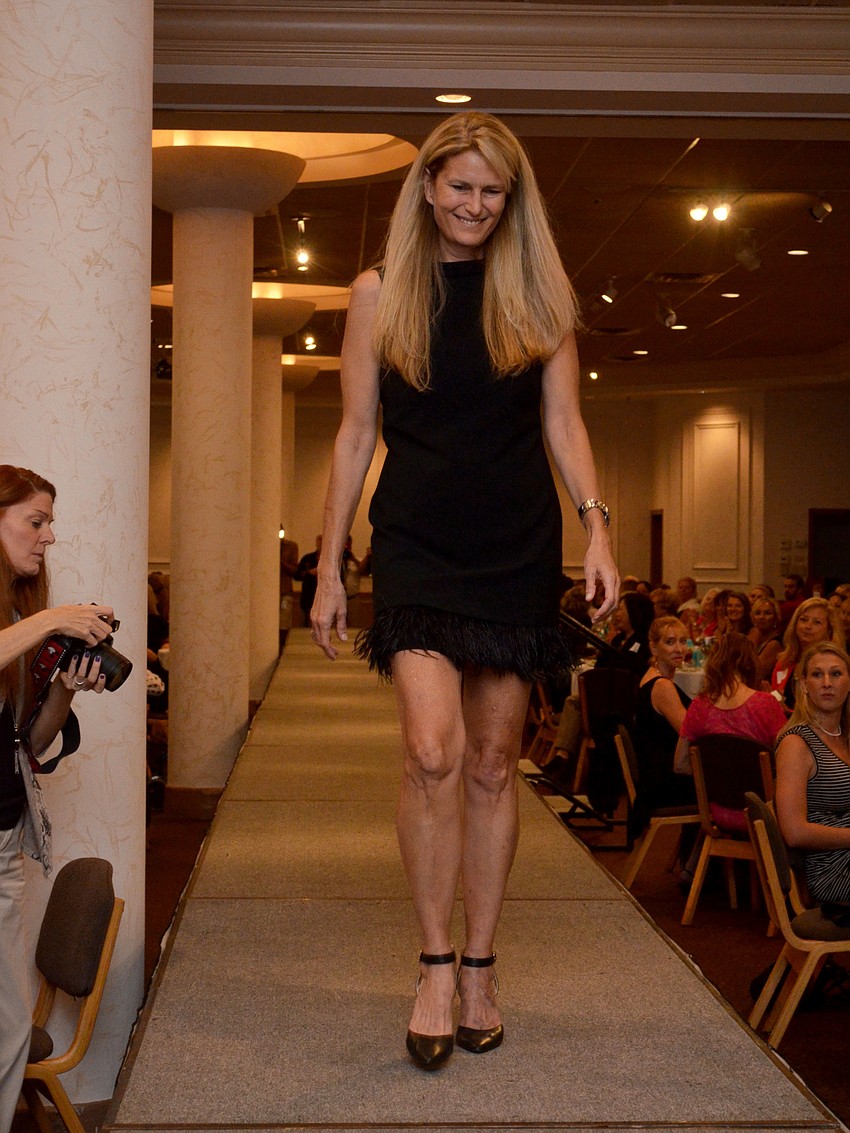 Local media women model in the Little Black Dress fashion show