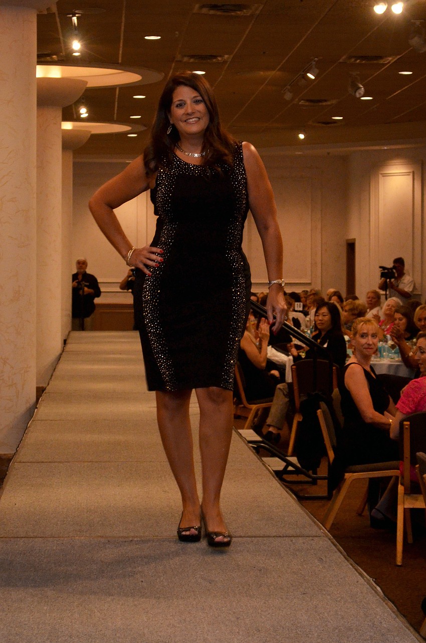 Local media women model in the Little Black Dress fashion show