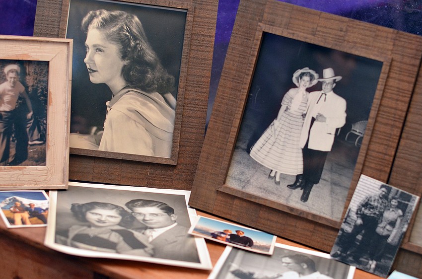A table of memories featuring photos from honorees Warren and Margot Covilleâ€™s 66 years of marriage were arranged on a table at the entrance of the tent at Starry Night Dinner I.
