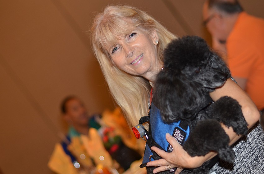 Constanza Bryant with her poodle Mailou