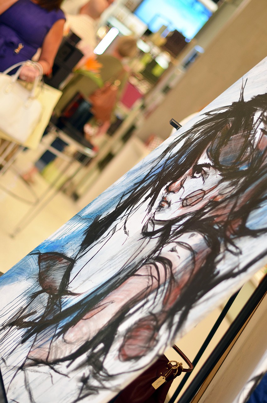 Artists Javo Rodriguez and Zach Gillilandâ€™s art was featured in the cosmetics department at Saks Fifth Avenue during the Brushes with Greatness event Friday, Nov. 7.