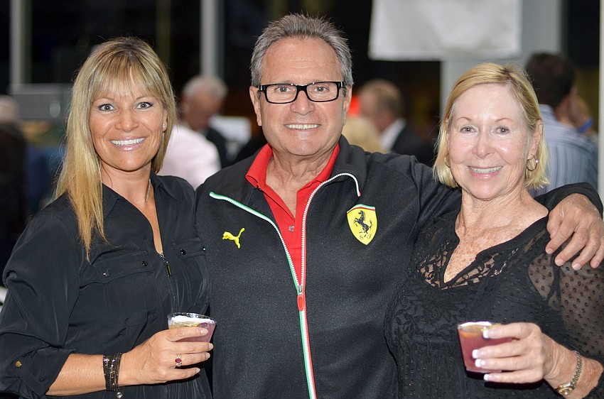 Stacie Baer with Ron and Samie Corirossi