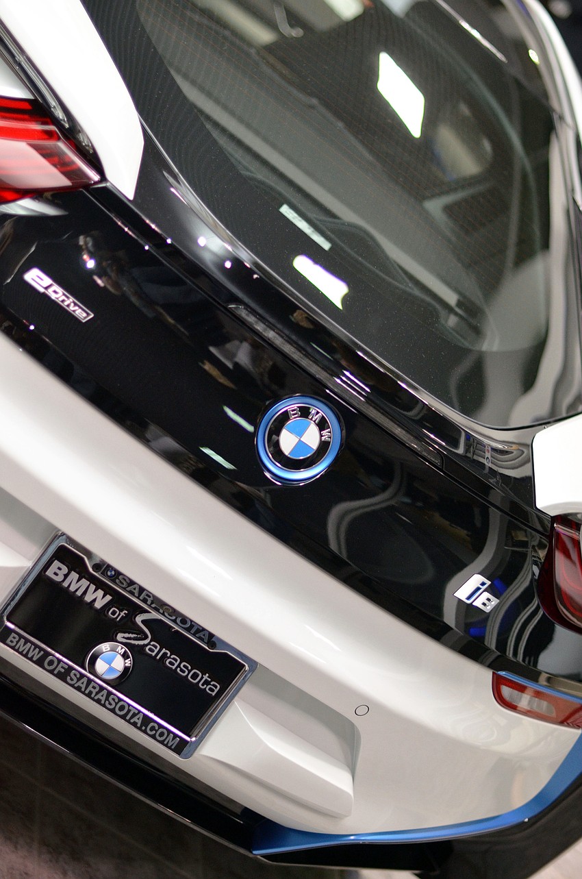 The Men Whiskey & Watches Pre-Party was hosted in the BMW of Sarasota showroom, featuring the new BMW i8.