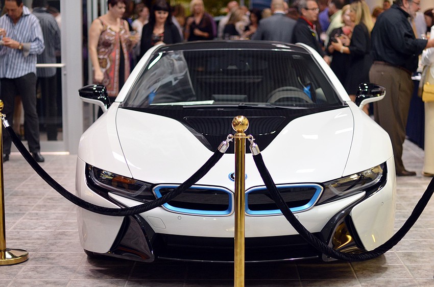 The Men Whiskey & Watches Pre-Party was hosted in the BMW of Sarasota showroom, featuring the new BMW i8.