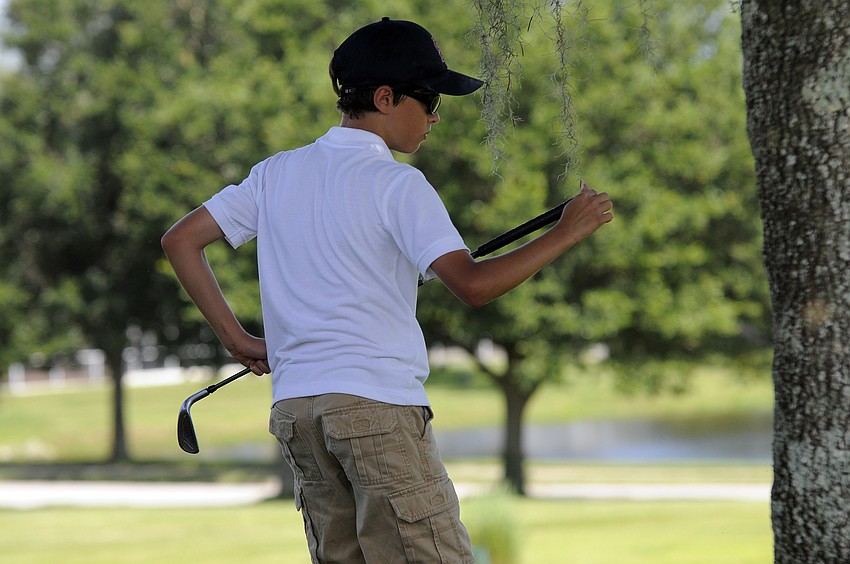 Ten-year-old Mason Minor’s favorite part of camp was pitching.